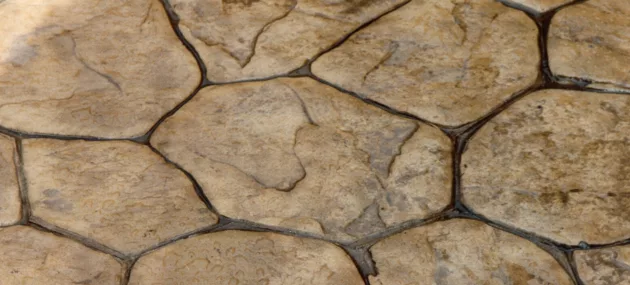 Pattern imprinted concrete by PICS, realistic stone texture.